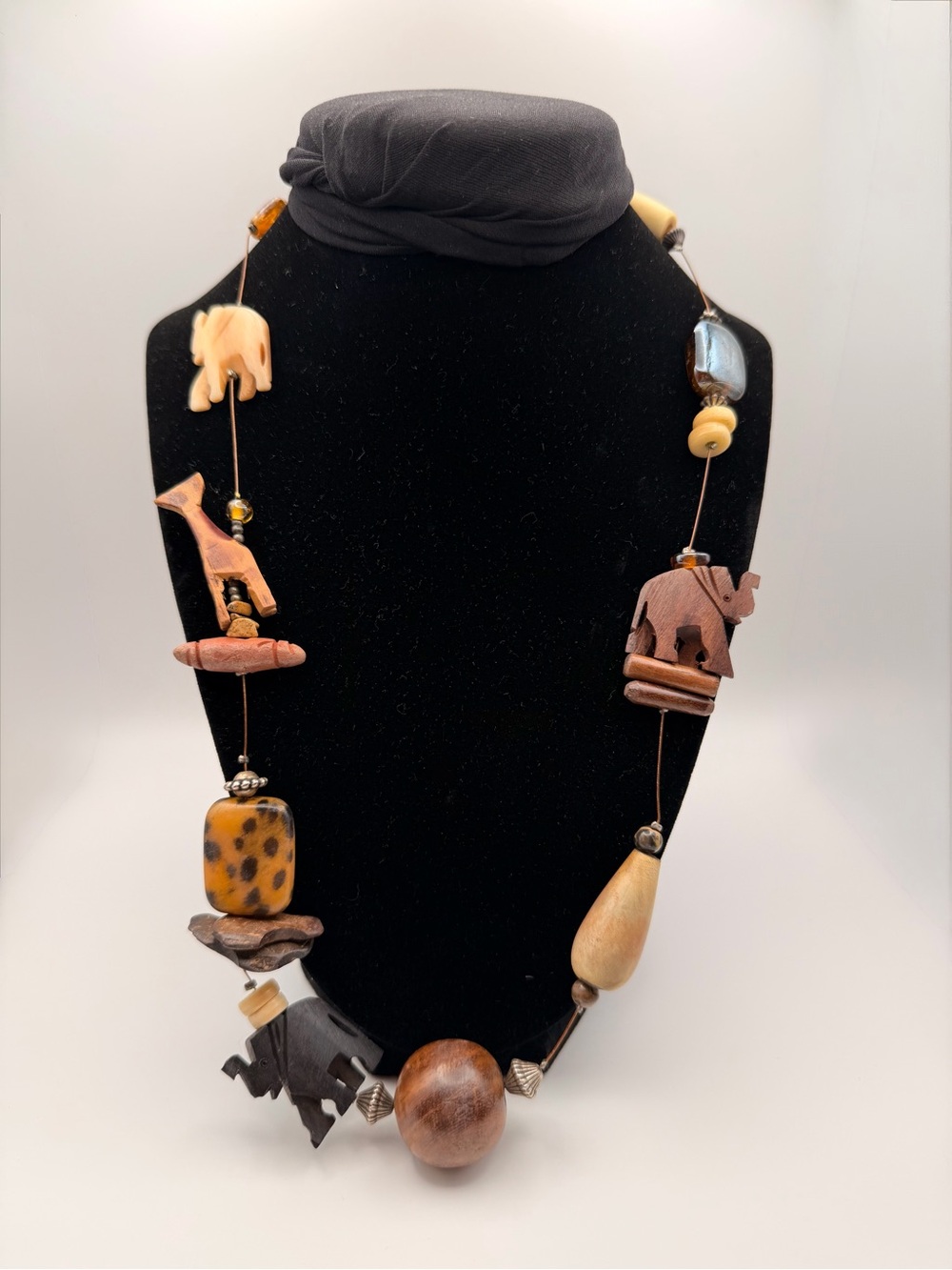 Treska Brown, Cream and Black Carved Animal Bead Necklace